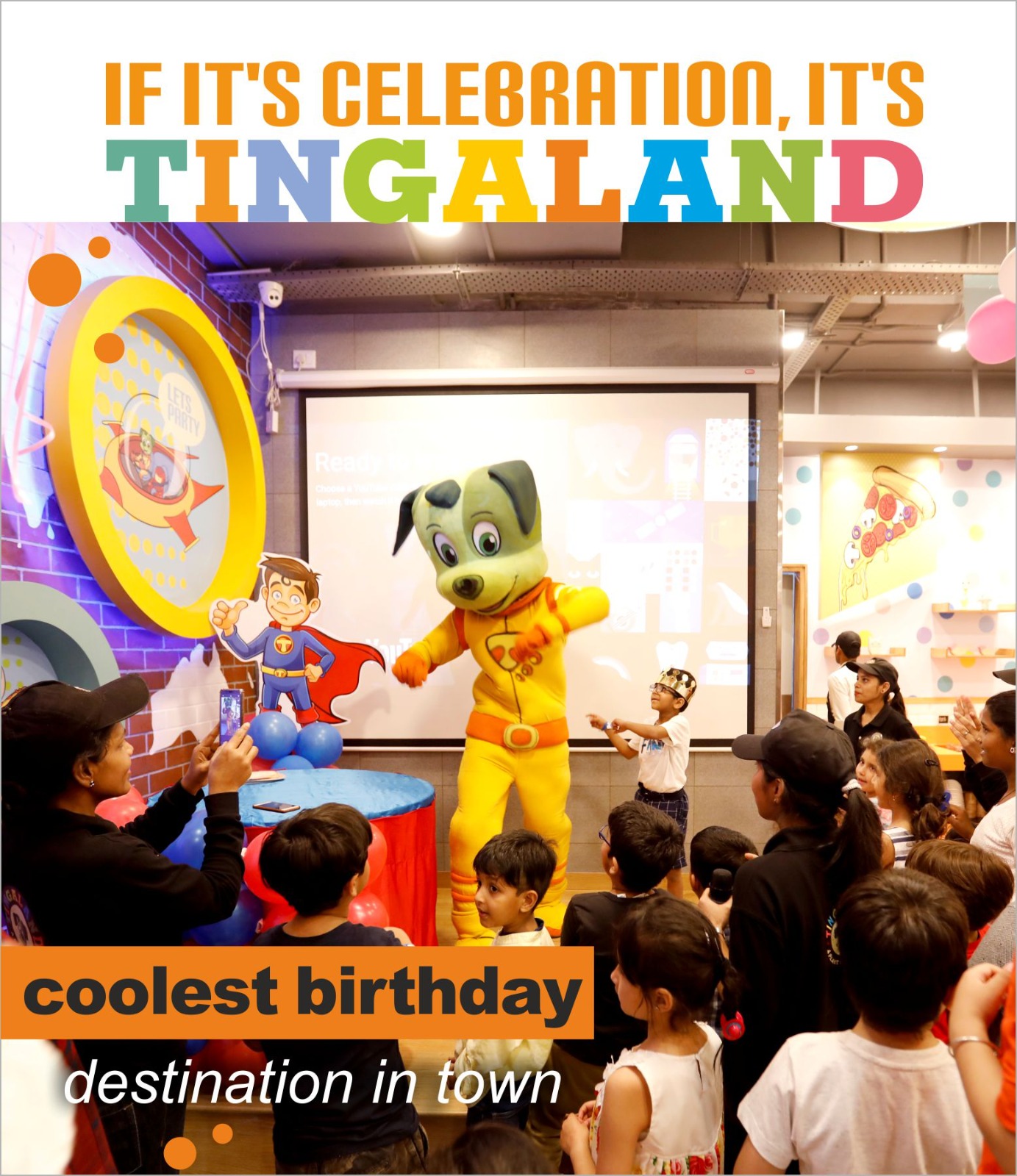 Tinga mascot greeting children